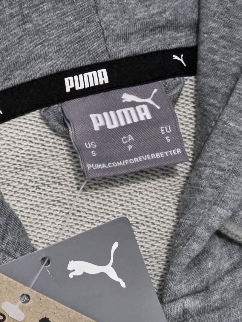 Puma Grey Zip-Up Hoodie (Category: Hoodies) located in Bulacan. Submitted by limitless.melai (Listing ID 1445665816, Image 2). Description: - Grey Puma zip-up hoodie - Classic Puma logo on chest - Drawstring hood - Front pockets - Comfortable and stylish - Ideal for casual wear or workouts.