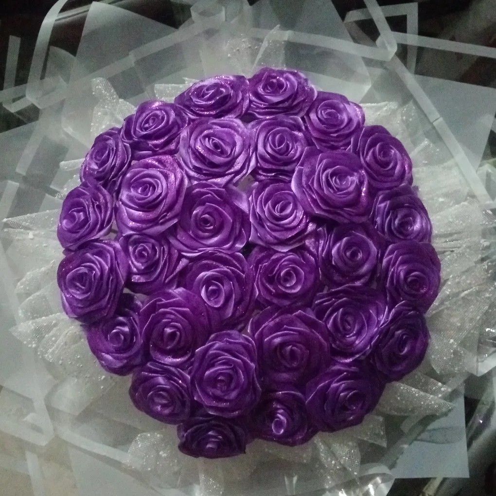 Purple Rose Satin Bouquet (Category: Flowers & Bouquets) located in Manila. Submitted by aian25 (Listing ID 1445788498, Image 1). Description: - 30 Rose satin flowers - Any color available - Add fee for rush order - Can send more pictures LOC: QC Mode of Payment: GCASH PAYMENT (need downpayment) Mode of Delivery: • Lalamove (buyer will shoulder the delivery fee) * meet up for pick up (around ust).