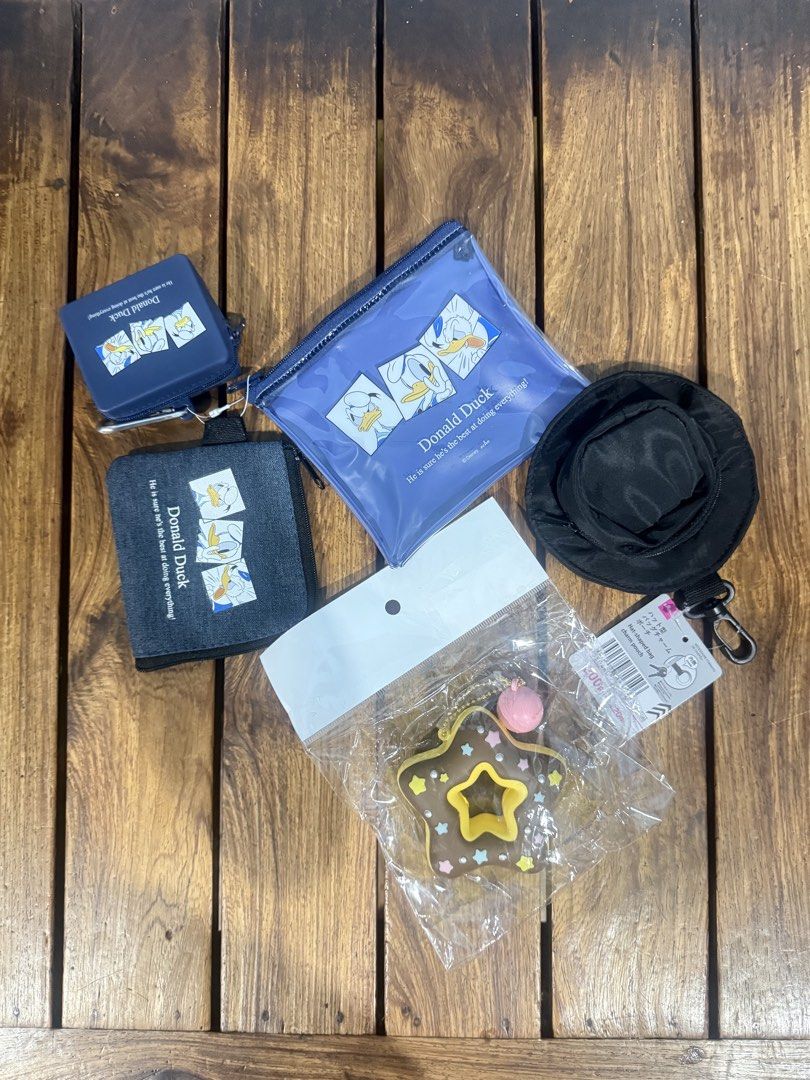 Random Collectibles Anik-anik (Category: Character Goods) located in Manila. Submitted by keeponsparklin (Listing ID 1445690604, Image 1). Description: Fresh from Japan 🇯🇵 Random Charms Anik-anik 100% Authentic ✨ Condition: 10/10 💙 •Donut Squishy - 100 •Daiso Hat Charm Pouch - 150 •Donald Duck Wallet Set - 250 •Take all - 400 Price is Negotiable 💸 Mod: Lalamove, Grab, J&T Meetup: Sm San Lazaro, 711 Tayuman, Lrt Tayuman Mop: Gcash.