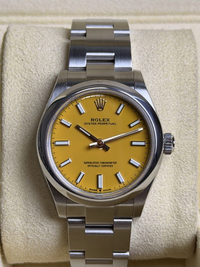 Rolex Oyster Perpetual Yellow (Category: Luxury Watches) located in Quezon City. Submitted by LuxPieces (Listing ID 1445782292, Image 2). Description: Rolex Oyster Perpetual Size 31mm Newest Mechanism Cal. 2232 Candy Yellow Dial (Stella Dial) Ref. 277200 Approximately 2020+ Watch and Box (lost card) only 460k only (cheapest in the market) 10/10 condition.