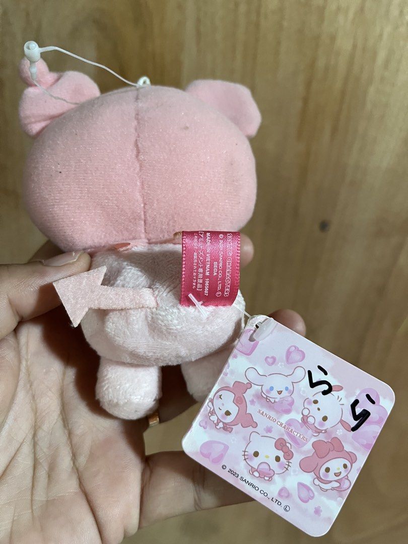 Sanrio My Melody Devil Pig Plush Keychain (Category: Plushies & Soft Toys) located in Tandag. Submitted by maryarlale42144 (Listing ID 1445618735, Image 2). Description: - Super cute pink devil pig plush toy - Resembles Sanrio's My Melody - Features a little tail and horns - Ideal for attaching to bags or keys - Comes with original tag - A must-have for any Sanrio fan!.