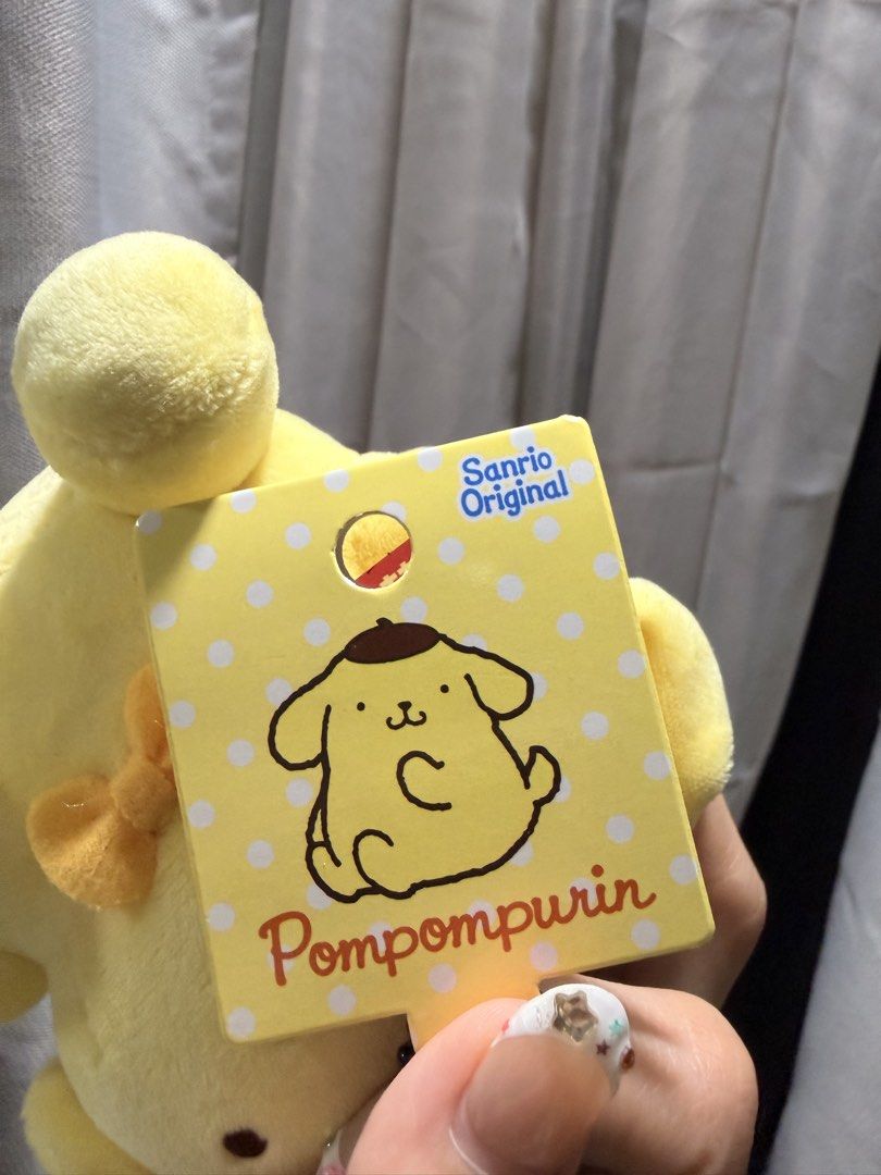 Sanrio Original Pompompurin Plush Toy Keychain (Category: Plushies & Soft Toys) located in Cebu City. Submitted by liatan08 (Listing ID 1445786800, Image 2). Description: Brand new and still with tag bought from the Sanrio Store in Japan. Bought around 450 pesos converted from yen, selling for exactly 400 pesos :) Cute Pompompurin plush toy with a keychain attachment. Sanrio Original item. Perfect for fans of Pompompurin. Great for bags or keys..