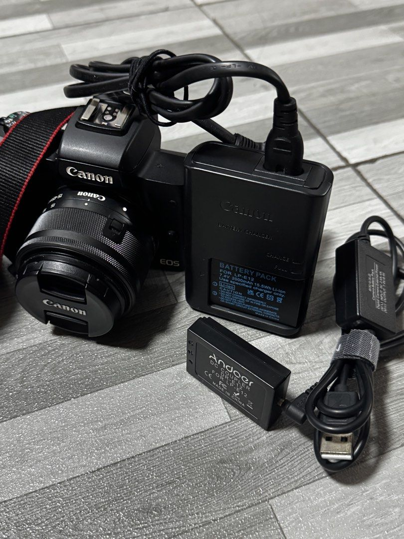 Canon M50 II Mirrorless Camera (Category: Cameras) located in Manila. Submitted by kirbyxblack (Listing ID 1445742015, Image 3). Description: Bought my M50 II for 43,000php. Selling: 30,000 (Fixed) Inclusions: •Canon EOS M50 II w/ 15-45mm Kit Lens •EF-S 18-200mm 3.5-5.6/f with Hood • EF 50mm 1.8/f with Hood • SiamDispo Dispo Lens (EF-M) • Original LP-E12 Charger •PALO LP-E12 2000mah Battery •Meike EF-S to EF-M Adaptor • Andoer Battery Pack (Good 