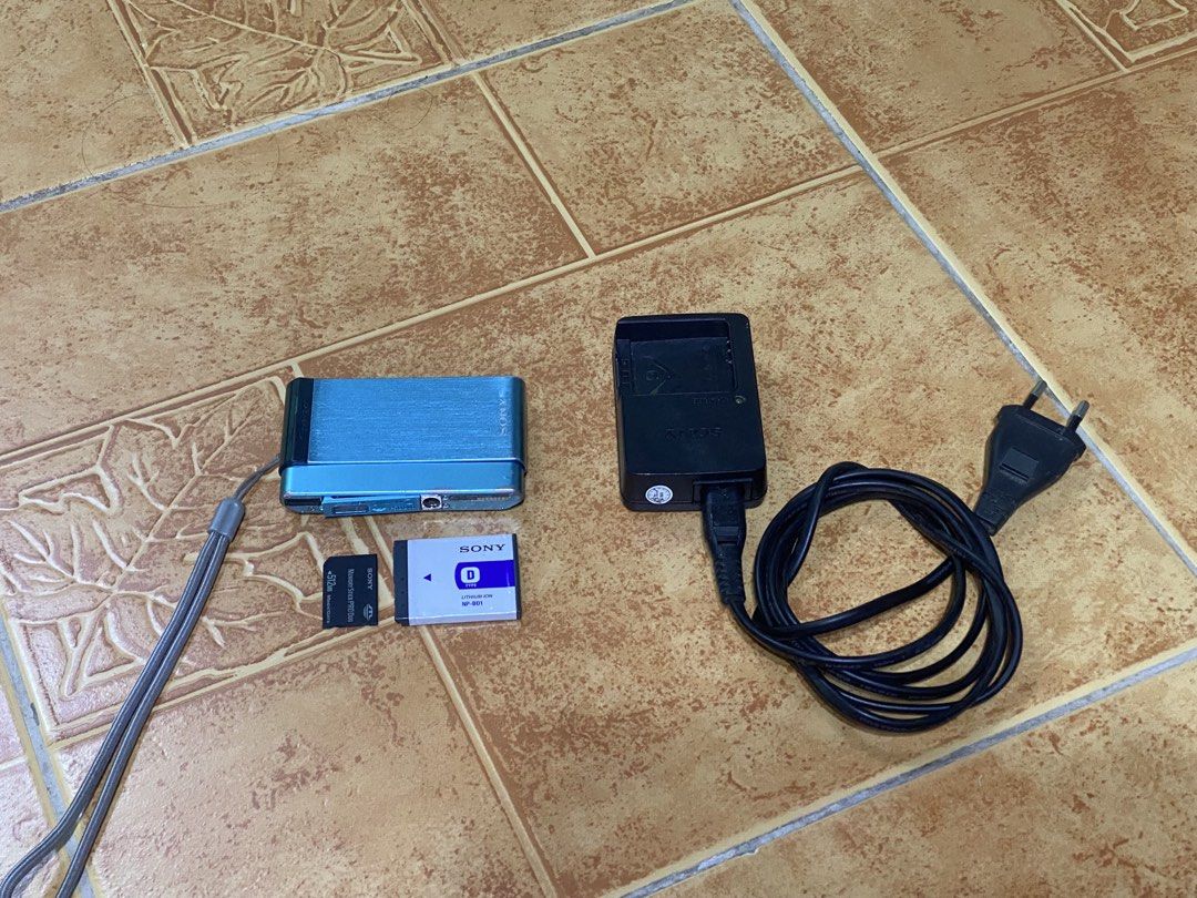 Sony DSC-T90 Cybershot Digital Camera (With Inclusions) (Category: Cameras) located in Abucay. Submitted by abeaver (Listing ID 1445713530, Image 2). Description: Inclusions: Camera Battery Charger Memory card Camera is working. However, it has the following issues: 1. Most of the time the flash doesn’t work 2. LCD burns but does not affect the photos (Swipe left to see sample photos) 3. Broken lock Note: Camera is well used Shipping Fee is shoul