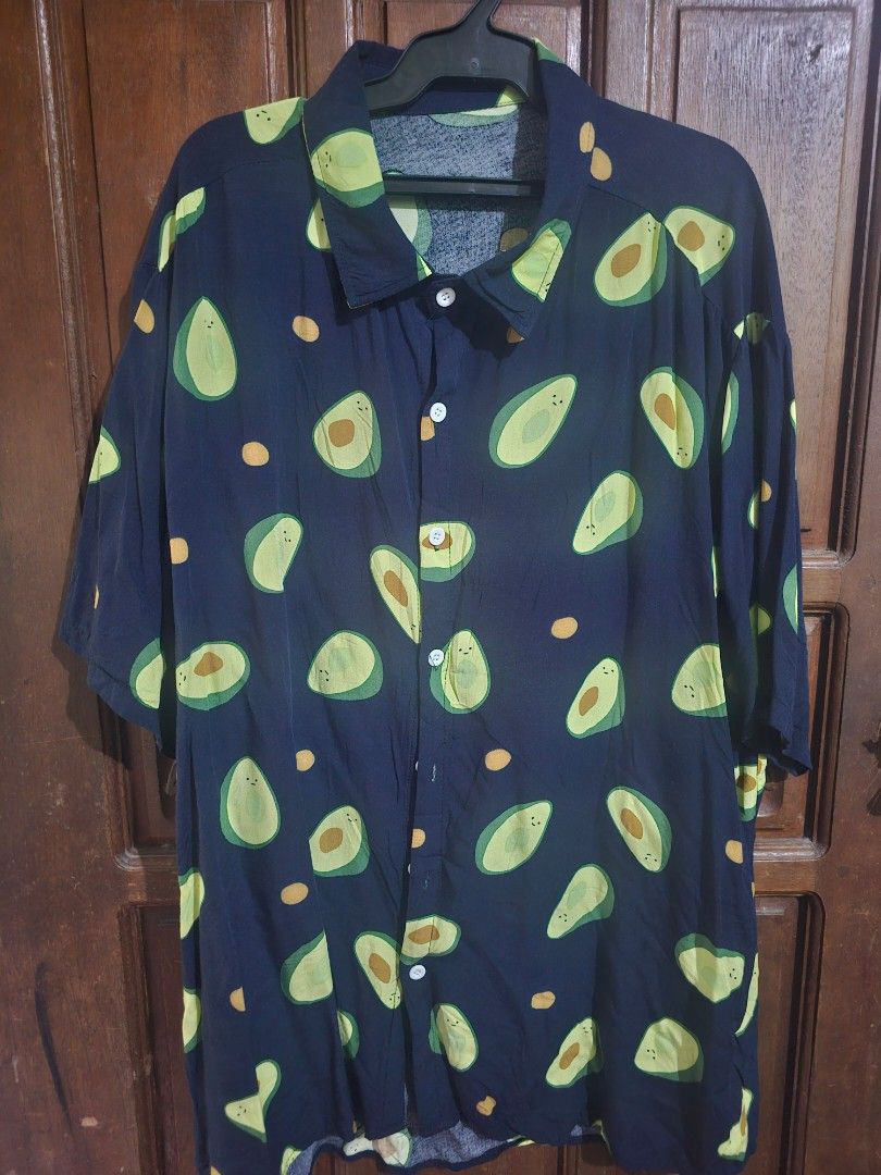 St. John's Bay Avocado Print (Category: Tshirts & Polo Shirts ) located in Manila. Submitted by john16bit (Listing ID 1445726200, Image 1). Description: Sizing: Large (W23xL30) ​Fabric: Lightweight Rayon ​Color: Navy Blue with Green Avocado print ​Condition: Preloved not ukay / Very Good condition (no visible flaws) RFS: Declutter, style changed.