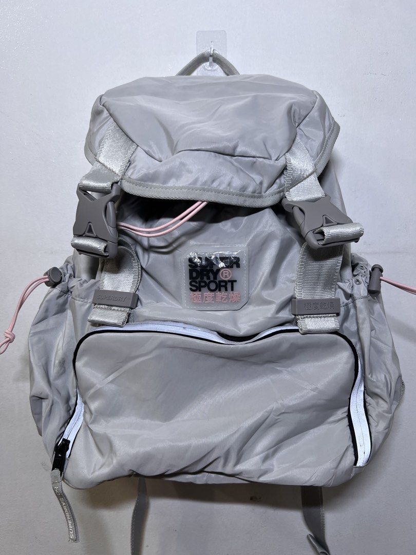 Superdry Sport Grey Backpack (Category: Backpacks) located in Manila. Submitted by almiradianneandres (Listing ID 1445749908, Image 1). Description: - Grey Superdry Sport backpack - Drawstring closure with front flap buckle straps - Side pockets with drawstring detail - Padded straps and back for comfort - Ideal for gym or everyday use.