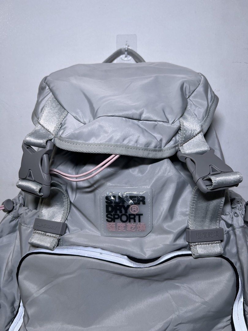 Superdry Sport Grey Backpack (Category: Backpacks) located in Manila. Submitted by almiradianneandres (Listing ID 1445749908, Image 3). Description: - Grey Superdry Sport backpack - Drawstring closure with front flap buckle straps - Side pockets with drawstring detail - Padded straps and back for comfort - Ideal for gym or everyday use.