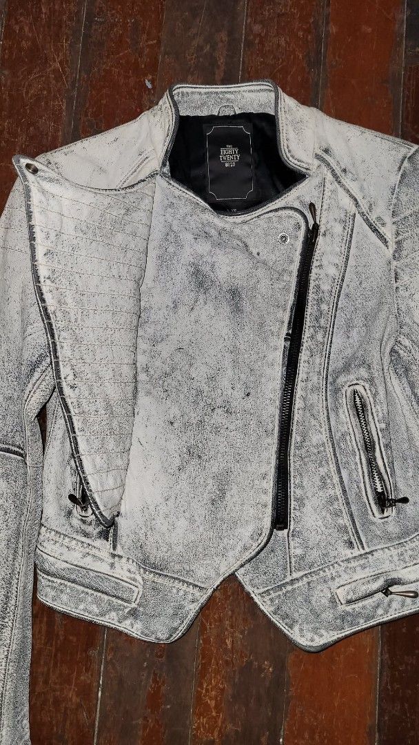 The Eighty Twenty 80-20 Acid Wash Leather Biker Jacket (Category: Coats, Jackets and Outerwear) located in Manila. Submitted by q55qb (Listing ID 1445693545, Image 3). Description: - Cool acid wash leather biker jacket - Brand: The Eighty Twenty - Asymmetrical zip front closure - Zipper pockets on the front - Zipper details on the cuffs - Black lining - Shell: 100% lamb leather - Lining: 100% acetate - A great addition to any wardrobe.