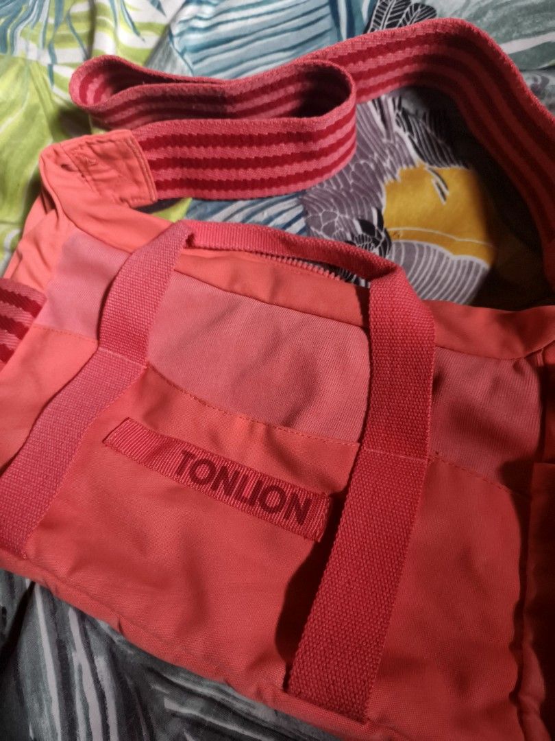Tonlion Medium Sports Sling Bag (Category: Cross-body Bags) located in Manila. Submitted by kitty.ribbon (Listing ID 1445669754, Image 2). Description: Chinese Brand Minimal Sign of use Sling bag W: 12 H: 9 F: Mixed Nylon and Canvas.