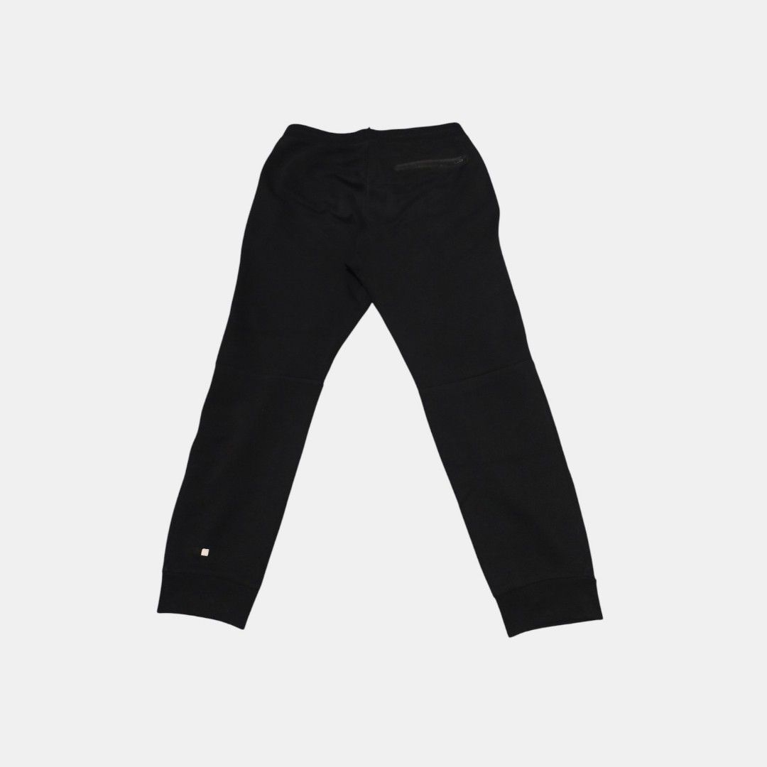 Uniqlo Dry Stretch Sweat Pants (Category: Joggers) located in Bacoor. Submitted by cavithrifts (Listing ID 1445651723, Image 2). Description: UNIQLO DRY STRETCH SWEAT PANTS - Size: Large - Waist: 33-36 - Length: 39 - Condition: Good - Comfortable black joggers - Drawstring waist for a perfect fit - Two zip pockets on the front - One zip pocket on the back - Cuffed ankles for a snug feel - Ideal for lounging, workouts, and daily wear.