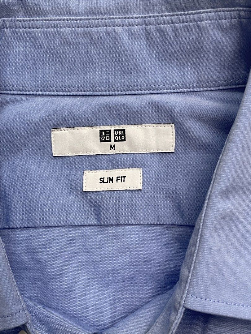 Uniqlo Light Blue Shirt (Category: Formal Shirts) located in Makati City. Submitted by pepperstoremerch (Listing ID 1445767028, Image 2). Description: Uniqlo Light Blue Shirt Top Size Medium Cotton Blend Has some discoloration on the back, please see pictures Preloved, good condition Please see pictures for issues/flaws D0084.