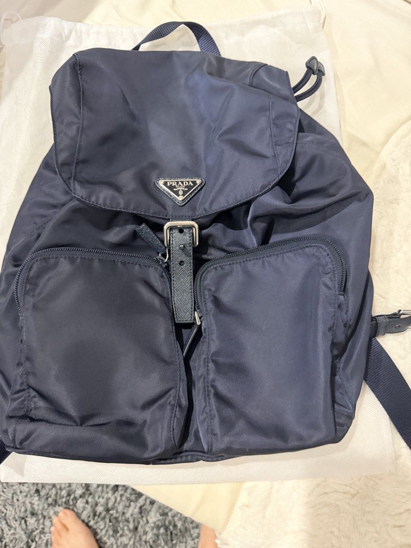 Used 3x Authentic Prada Backpack Navy shw (Category: Luxury Bags & Wallets) located in Makati City. Submitted by georgiaetc (Listing ID 1445673464, Image 1). Description: Excellent condition Super clean inside out Bought from prada outlet store italy in 2018 Stored & barely used No dustbag Bag only Do not offer if in doubt Pay before booking / shipping Open for meet ups Super duper nice in actual .