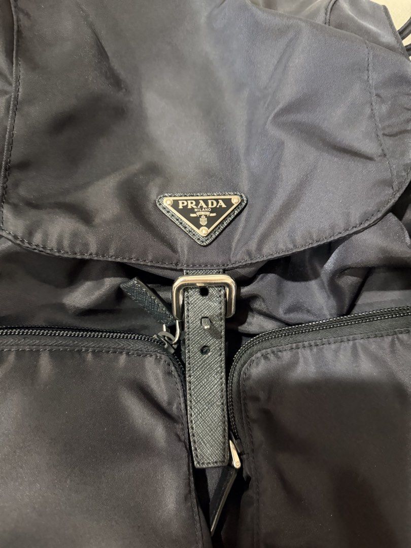 Used 3x Authentic Prada Backpack Navy shw (Category: Luxury Bags & Wallets) located in Makati City. Submitted by georgiaetc (Listing ID 1445673464, Image 3). Description: Excellent condition Super clean inside out Bought from prada outlet store italy in 2018 Stored & barely used No dustbag Bag only Do not offer if in doubt Pay before booking / shipping Open for meet ups Super duper nice in actual .