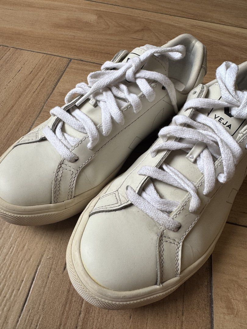 Veja Sneakers White Leather Lace-up (Category: Sneakers) located in Rodriguez. Submitted by cords.treasure (Listing ID 1445669758, Image 3). Description: - White Veja sneakers - Genuine leather material - Lace-up closure for a secure fit - Signature Veja logo on the side and heel - Comfortable for all-day wear - Ideal for casual outfits - Soles show some wear.