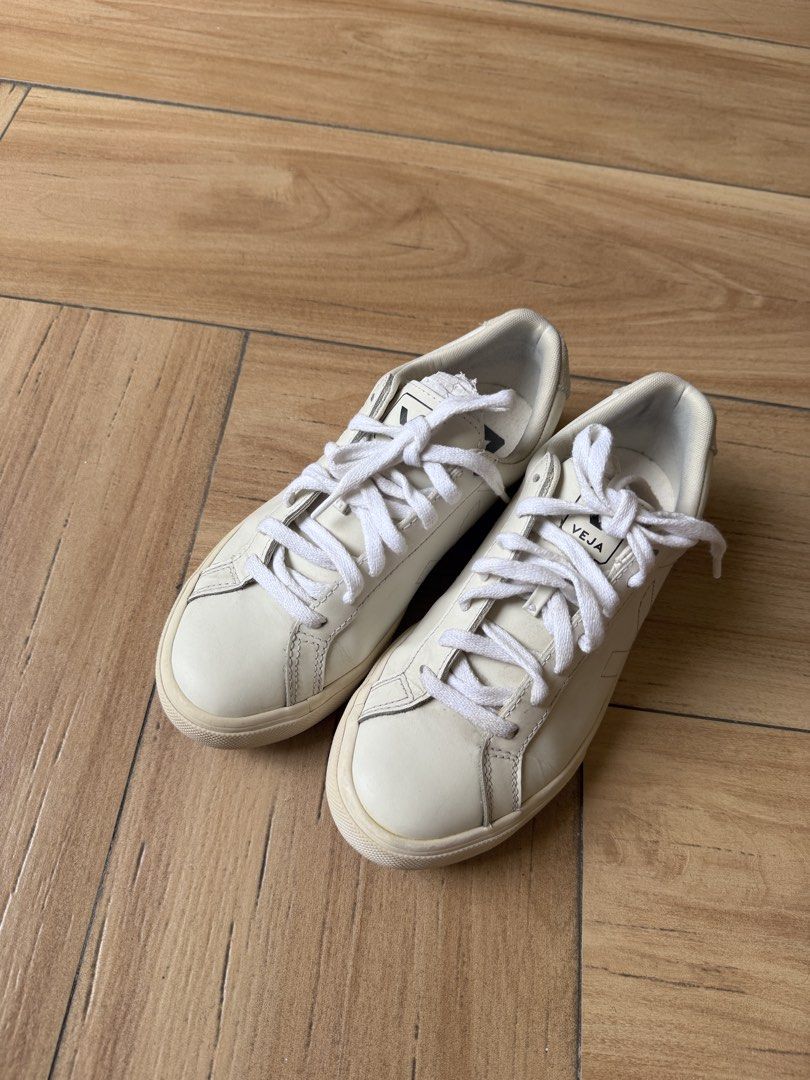 Veja Sneakers White Leather Lace-up (Category: Sneakers) located in Rodriguez. Submitted by cords.treasure (Listing ID 1445669758, Image 2). Description: - White Veja sneakers - Genuine leather material - Lace-up closure for a secure fit - Signature Veja logo on the side and heel - Comfortable for all-day wear - Ideal for casual outfits - Soles show some wear.