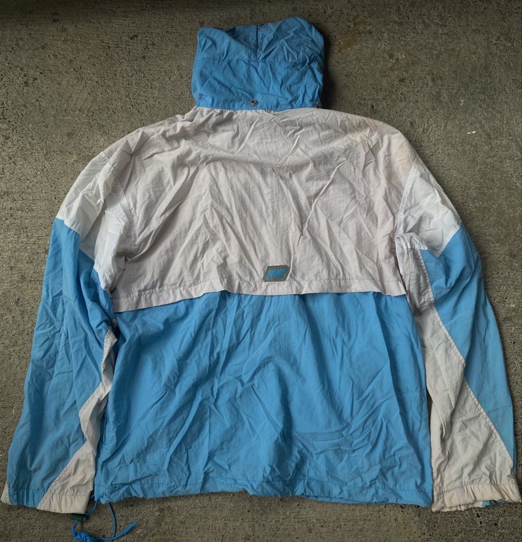 Vintage 90s nike windbreaker jacket (Category: Coats, Jackets and Outerwear) located in Kalibo. Submitted by bryaninosa20819 (Listing ID 1445617727, Image 2). Description: Vintage 90s nike windbreaker jacket Dimes : 26x27 Boxy Very Good Condition Color Rate 9/10 Need Wash Washable Stain.