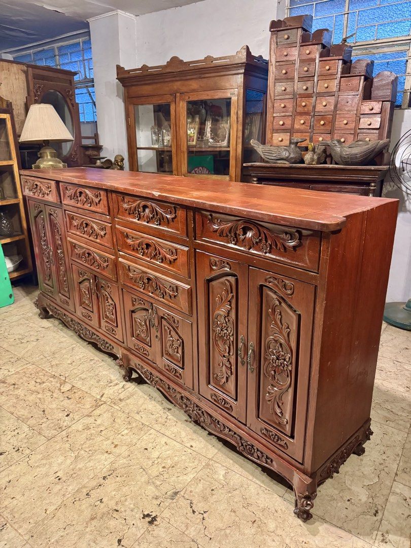 Vintage Buffet Table with Intricate Carvings (Category: Tables & Sets) located in Manila. Submitted by sinaunang_gamit (Listing ID 1445633688, Image 2). Description: Vintage Buffet Table with Intricate Carvings Length: 84 inches (7ft) Height: 40 inches Width: 17 inches ₱18k.