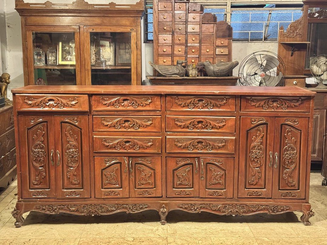 Vintage Buffet Table with Intricate Carvings (Category: Tables & Sets) located in Manila. Submitted by sinaunang_gamit (Listing ID 1445633688, Image 1). Description: Vintage Buffet Table with Intricate Carvings Length: 84 inches (7ft) Height: 40 inches Width: 17 inches ₱18k.