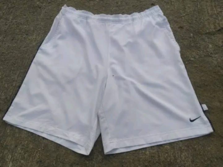 Vintage Nike white shorts (Category: Shorts) located in Guiguinto. Submitted by selected_3rp (Listing ID 1445682509, Image 3). Description: vintage Nike white shorts embroidered swoosh size XL no issue pm.