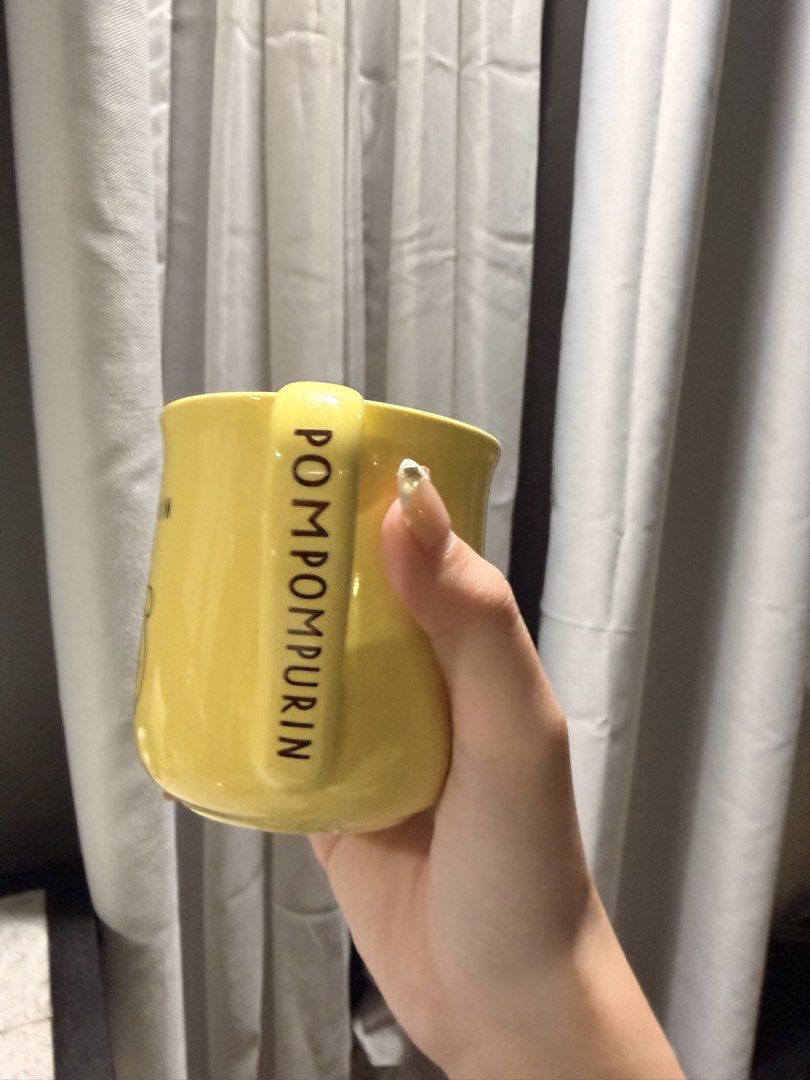 Yellow Pompompurin Mug bought directly from Japan (Category: Coffee & Tea Tableware) located in Cebu City. Submitted by liatan08 (Listing ID 1445786712, Image 2). Description: Bought directly from Japan Sanrio store Perfect for any pompom fan! Dishwasher safe :) loved using it with teas and juices made the drinking experience so much cuter.