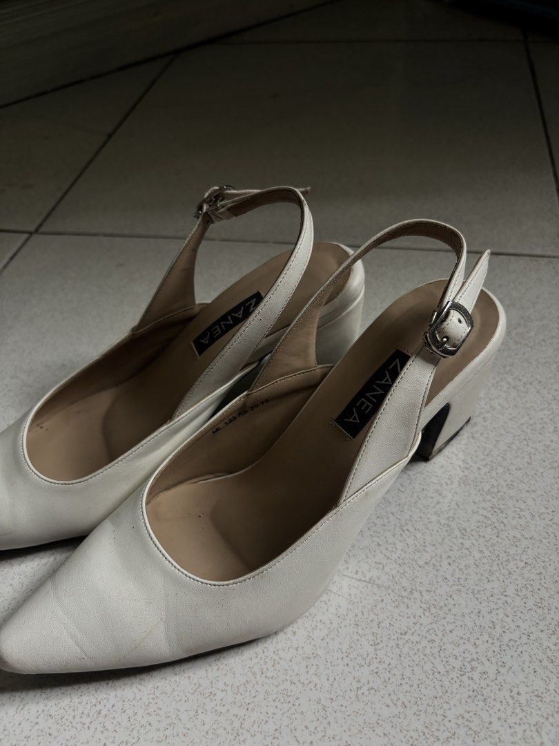 Zanea White Slingback Heels & Black Transparent Heels (Category: Heels) located in Bulacan. Submitted by hanneea (Listing ID 1445614952, Image 2). Description: Buy this 2 for ₱999 - Zanea White Slingback Heels: Pointed toe, block heel, adjustable ankle strap. - Black Pointed Toe Heels: Transparent sides, elastic slingback strap. - Both are versatile and stylish for any occasion..