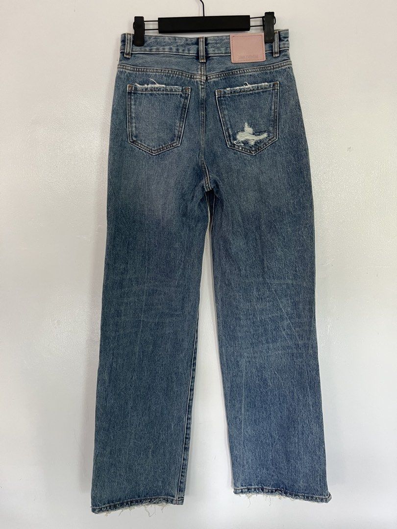 ZARA Blue Distressed Wide Leg Jeans (Category: Jeans) located in Marikina City. Submitted by taylorm31 (Listing ID 1445614321, Image 2). Description: - Brand: ZARA - Style: High-waisted blue denim jeans - Closure: Button fly - Details: Distressed knees and thighs - Fit: Wide leg with raw hem and side slits - Origin: Made in Pakistan - Size: EUR 34 (US 2, MEX 24) MOP: BPI / Gcash .