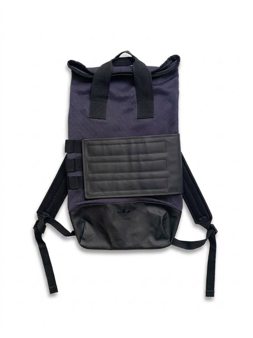 Adidas Roll Top Backpack (Category: Backpacks) located in Singapore. Submitted by zo-mo (Listing ID 1445844708, Image 1). Description: Authentic ADIDAS product. Used but fully functional. Cosmetic condition: 8/10 (some surface scratches and scraped paint on zipper head from normal use, as seen in last 2 pics) Cleaned and ready to use! PRICE FIXED. COLLECT AT KHATIB MRT STATION..
