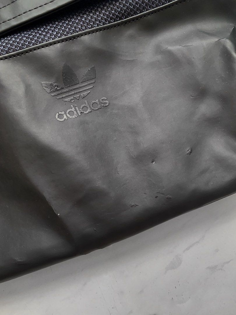 Adidas Roll Top Backpack (Category: Backpacks) located in Singapore. Submitted by zo-mo (Listing ID 1445844708, Image 6). Description: Authentic ADIDAS product. Used but fully functional. Cosmetic condition: 8/10 (some surface scratches and scraped paint on zipper head from normal use, as seen in last 2 pics) Cleaned and ready to use! PRICE FIXED. COLLECT AT KHATIB MRT STATION..