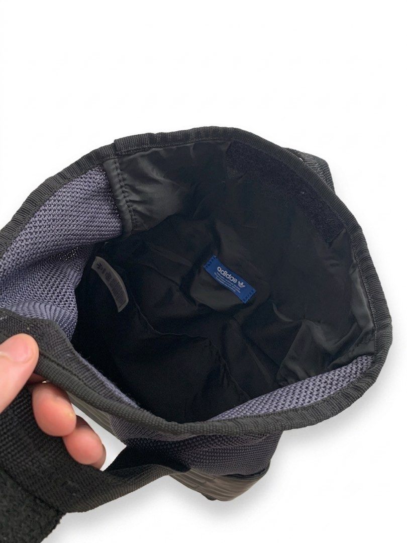 Adidas Roll Top Backpack (Category: Backpacks) located in Singapore. Submitted by zo-mo (Listing ID 1445844708, Image 3). Description: Authentic ADIDAS product. Used but fully functional. Cosmetic condition: 8/10 (some surface scratches and scraped paint on zipper head from normal use, as seen in last 2 pics) Cleaned and ready to use! PRICE FIXED. COLLECT AT KHATIB MRT STATION..