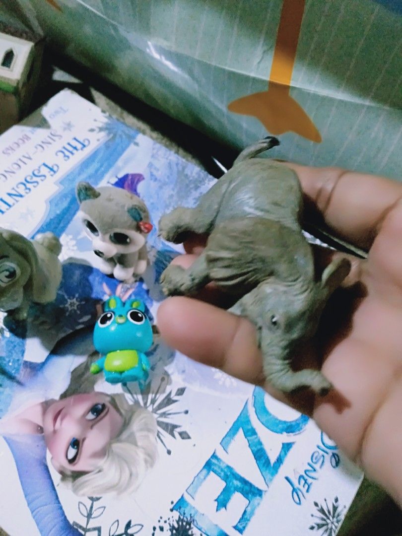 Assorted Animal and Character Toy Figurines Bundle (Category: Figurines & Statues) located in Davao. Submitted by bravemoon_556cd5 (Listing ID 1445881102, Image 3). Description: - Bundle of 6 toy figurines - Includes: grey wolf, elephant, bunny, small owl, dinosaur, and brown teddy bear - Some figurines are from popular franchises - Ideal for toy collectors or children's play - All items are pictured.