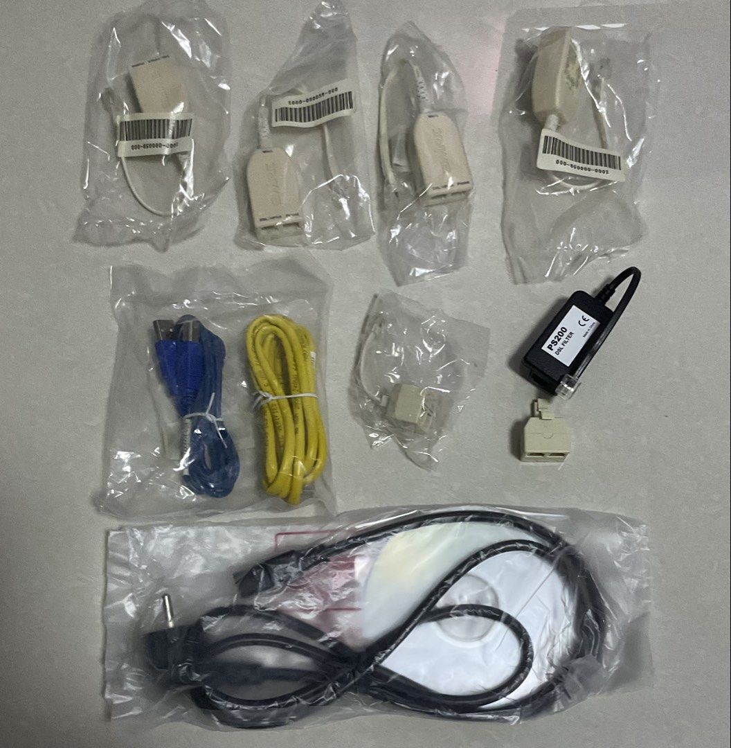 Assorted Computer Cables, Adapters, and PS2 Filter (Category: Cables & Adaptors) located in Singapore. Submitted by collectablessg50 (Listing ID 1445922921, Image 1). Description: - Bundle of computer accessories - Includes USB cables - Includes Ethernet cables - Includes various adapters - Includes PS2 filter - Includes a CD - All items are individually packaged - Ideal for expanding computer connectivity or for troubleshooting needs.