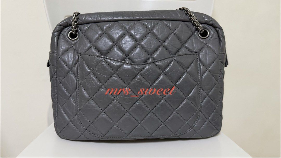 Authentic Chanel Reissue 2.55 Grey Leather Shoulder Bag (Category: Luxury Bags & Wallets) located in Valenzuela. Submitted by mrs_sweet (Listing ID 1445816597, Image 3). Description: - Authentic Grey Leather Chanel Reissue 2.55 Bag Large Camera Bag - Iconic Quilted Design - Silver-Tone Turn-Lock Closure - Versatile Double Chain Strap - Classic Flap Style - Suitable for Day or Night Wear - Stain on 1 side of the bag (another bag material got stick