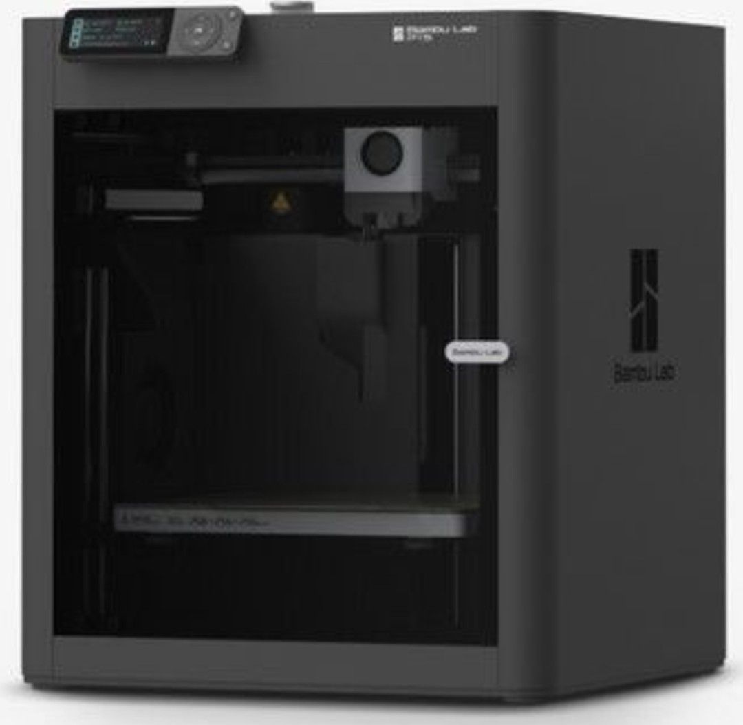 Bambu Lab 3D Printer p1s (Category: Printers, Scanners & Copiers) located in Singapore. Submitted by www.renostop.com (Listing ID 1445838721, Image 1). Description: - Bambu Lab 3D printer - Sleek black casing - Digital display on top - Enclosed design for modern look - Build plate visible inside - Ready for your next project.