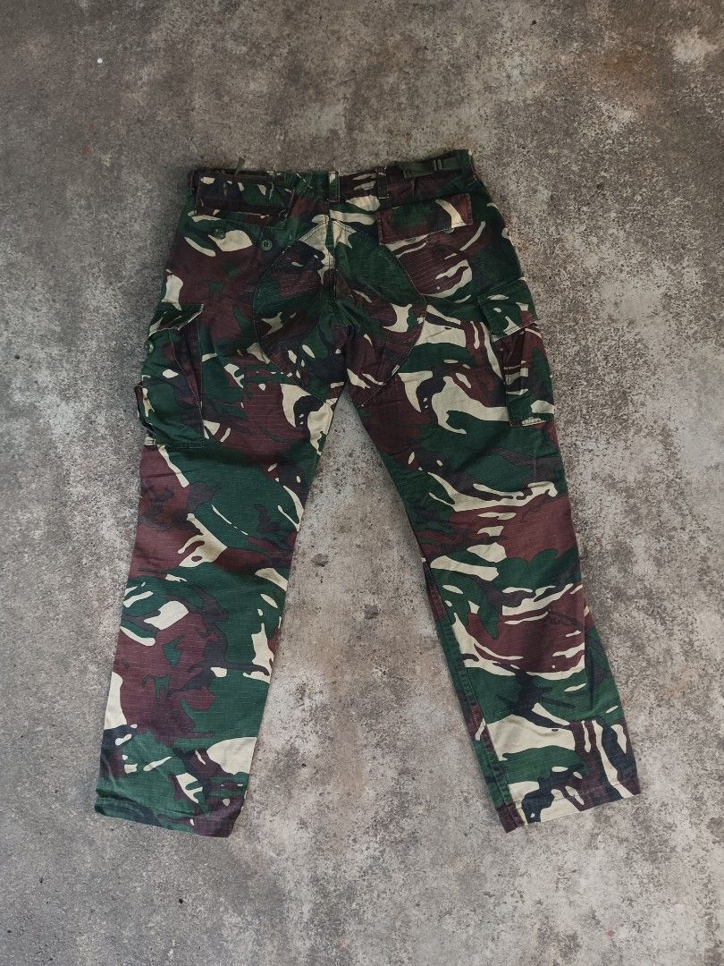 BDU camouflage repro military pants (Category: Jeans) located in Davao. Submitted by hisdef (Listing ID 1445889705, Image 2). Description: BDU camouflage repro military pants Condition- lightly used issue- tear and scratch (see pic) Dimensions in inches waistline-34 front rise-10 outseam/ length-37 inseam-27 thigh-13 knee-9 hem-7.5 15.