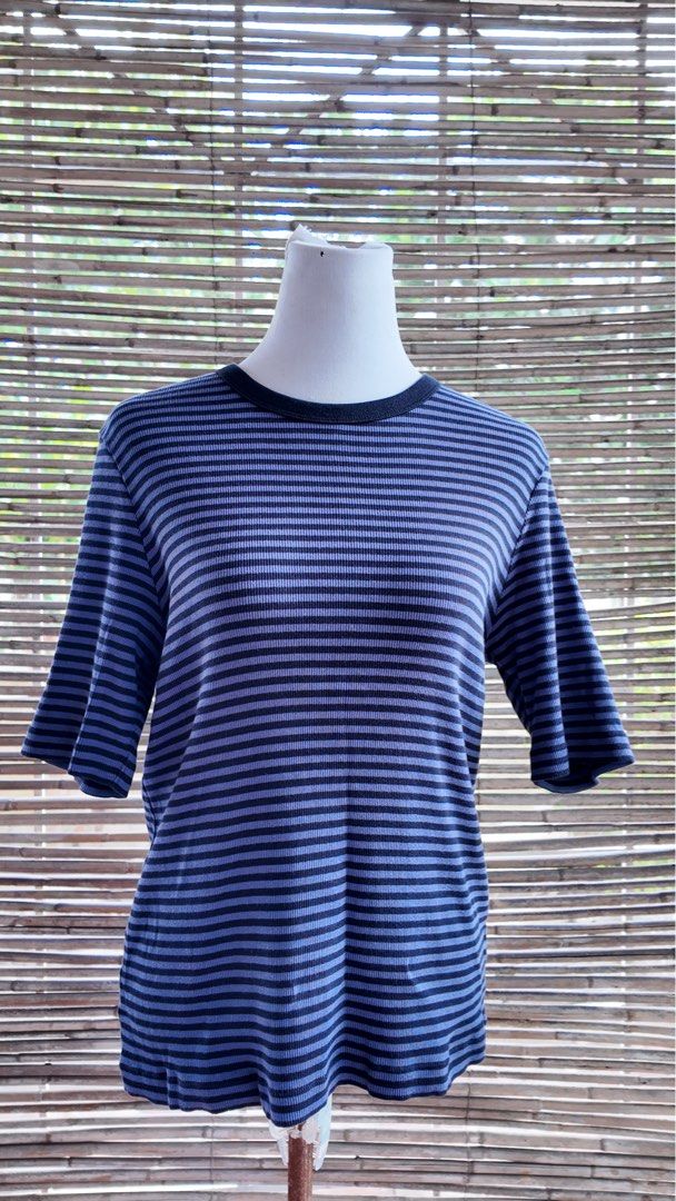 Blue and Black Striped T-shirt (Category: Tshirts & Polo Shirts ) located in Paranaque City. Submitted by lhenlhen0021 (Listing ID 1445918932, Image 1). Description: - Classic blue and black stripes - Ribbed texture fabric - Short sleeves - Relaxed fit - Ideal for casual wear - Pairs well with jeans or shorts - Versatile wardrobe staple - fit Large to XL.