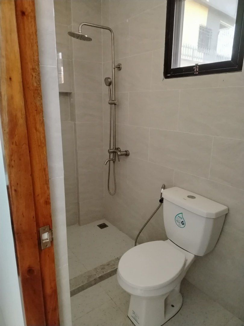 Brand New House & Lot (Category: House & Lot) located in Quezon City. Submitted by mperalta088 (Listing ID 1445895141, Image 3). Description: House and lot at Bismark st. Brookside hills subdivision. 145sqm lot area approx. 300sqm floor area; Master’s bedroom with balcony, 2 bedrooms, 3 toilet and bath, 2 car garage, service room, spacious roofdeck. Add-ons upon d/p dirty kitchen, shower enclosures, 3split-type aircon, pantry closet under the sta