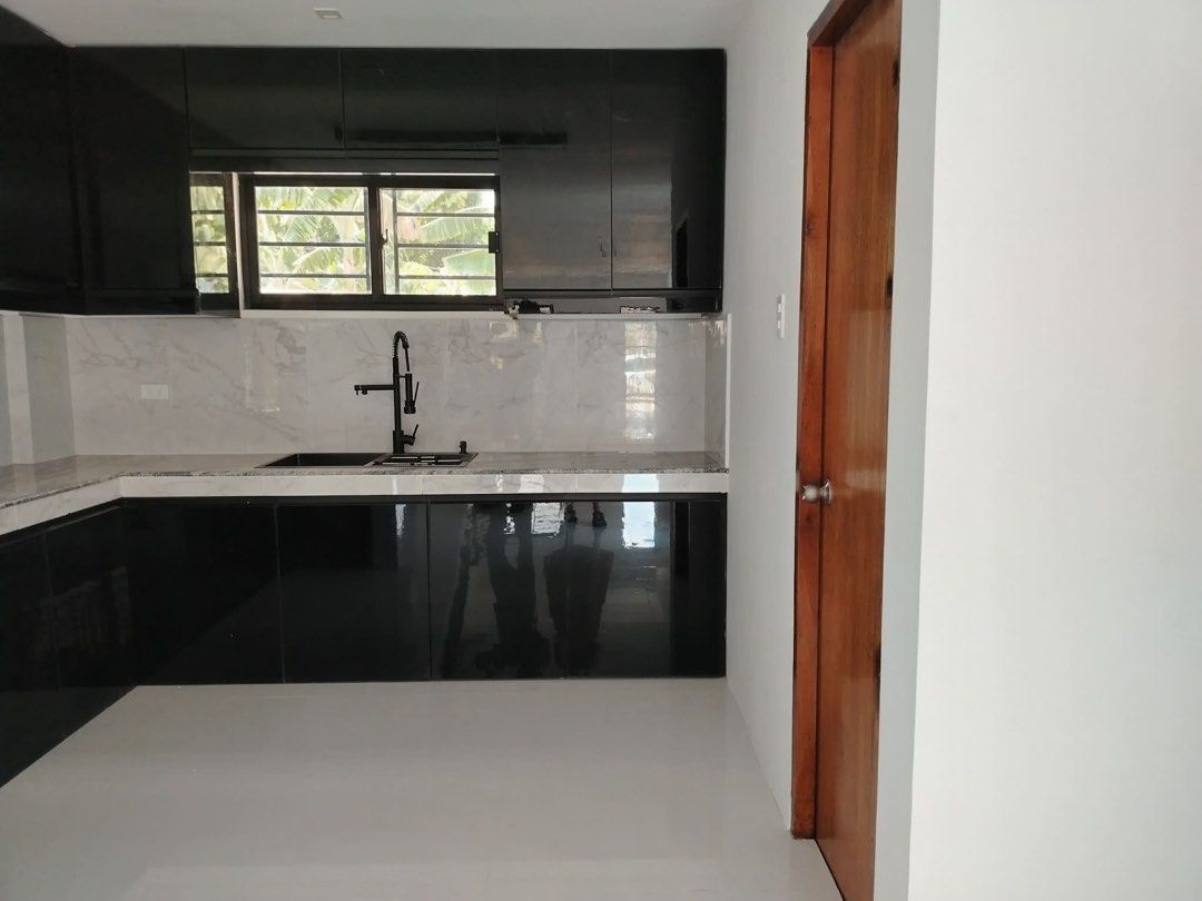 Brand New House & Lot (Category: House & Lot) located in Quezon City. Submitted by mperalta088 (Listing ID 1445895141, Image 2). Description: House and lot at Bismark st. Brookside hills subdivision. 145sqm lot area approx. 300sqm floor area; Master’s bedroom with balcony, 2 bedrooms, 3 toilet and bath, 2 car garage, service room, spacious roofdeck. Add-ons upon d/p dirty kitchen, shower enclosures, 3split-type aircon, pantry closet under the sta