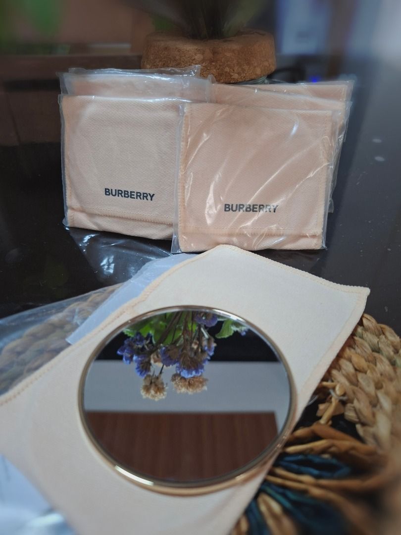 Burberry Gold Compact Mirror with Pouches (Category: Accessory Holder, Box & Organizers) located in Tuguegarao City. Submitted by thosphbys49295 (Listing ID 1445884404, Image 1). Description: - Authentic Burberry compact mirror - Elegant gold finish - Engraved with 'Burberry Gold' - Comes with original dust pouches (multiple included) - Compact and portable for easy touch-ups.