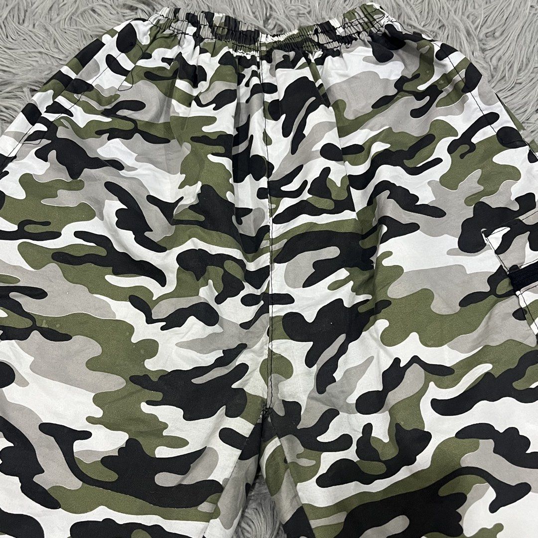 Camouflage Cargo Shorts with Zipped Pockets (Category: Other Bottoms) located in Rizal. Submitted by best.dressedx (Listing ID 1445965575, Image 2). Description: 🤍 ~ swipe photos to see when worn 🤍 ~ fits xs-m (garterized) 🤍 ~ has flaws but barely noticeable (check photos) 🤍 ~ delivery via j&t.