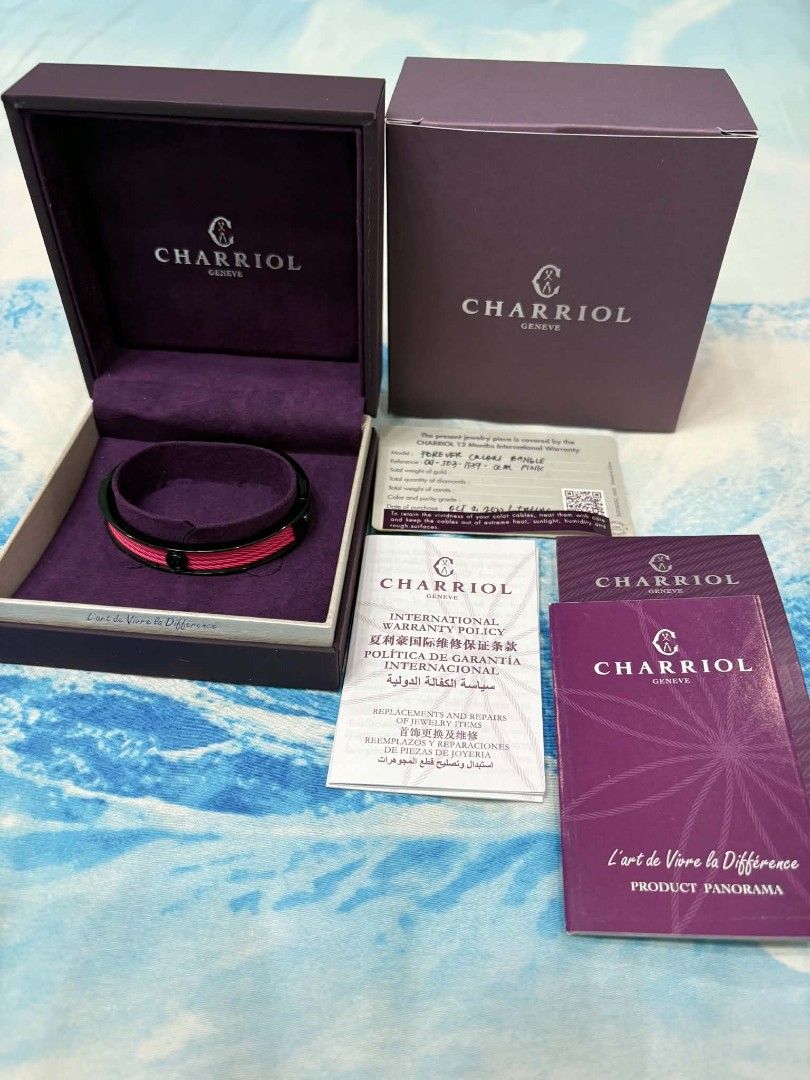 Charriol Geneva Bangle Bracelet Pink Cable with Black Accent (Category: Bracelets) located in Mandaluyong City. Submitted by recelrosa (Listing ID 1445823598, Image 2). Description: - Authentic Charriol Geneva Forever Color Bangle Pink - Signature pink cable design - Black accent with Charriol logo centerpiece - Comes with original box - Includes authenticity cards - A stunning statement piece.