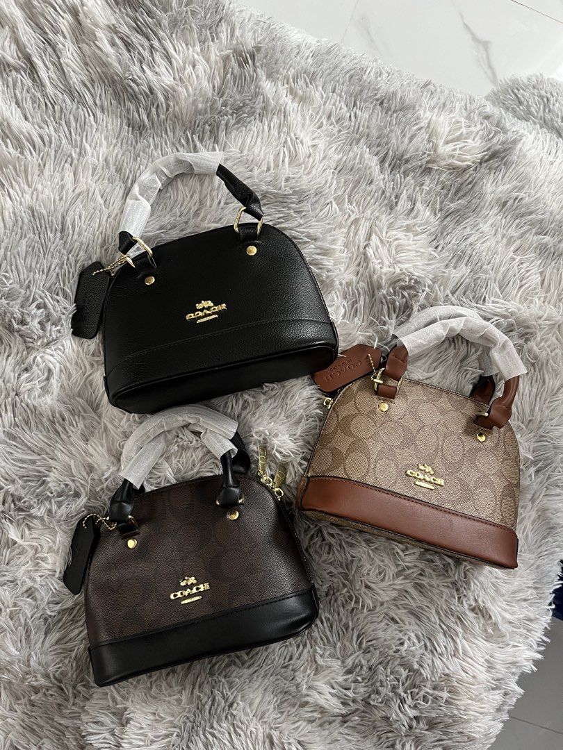Coach Mini Dome Bag - Multiple Colors Available (Category: Luxury Bags & Wallets) located in Binan City. Submitted by machatto.declutter (Listing ID 1445881168, Image 2). Description: 🏷️ ₱800 each complete inclusions w sling, dust bag, and box.
