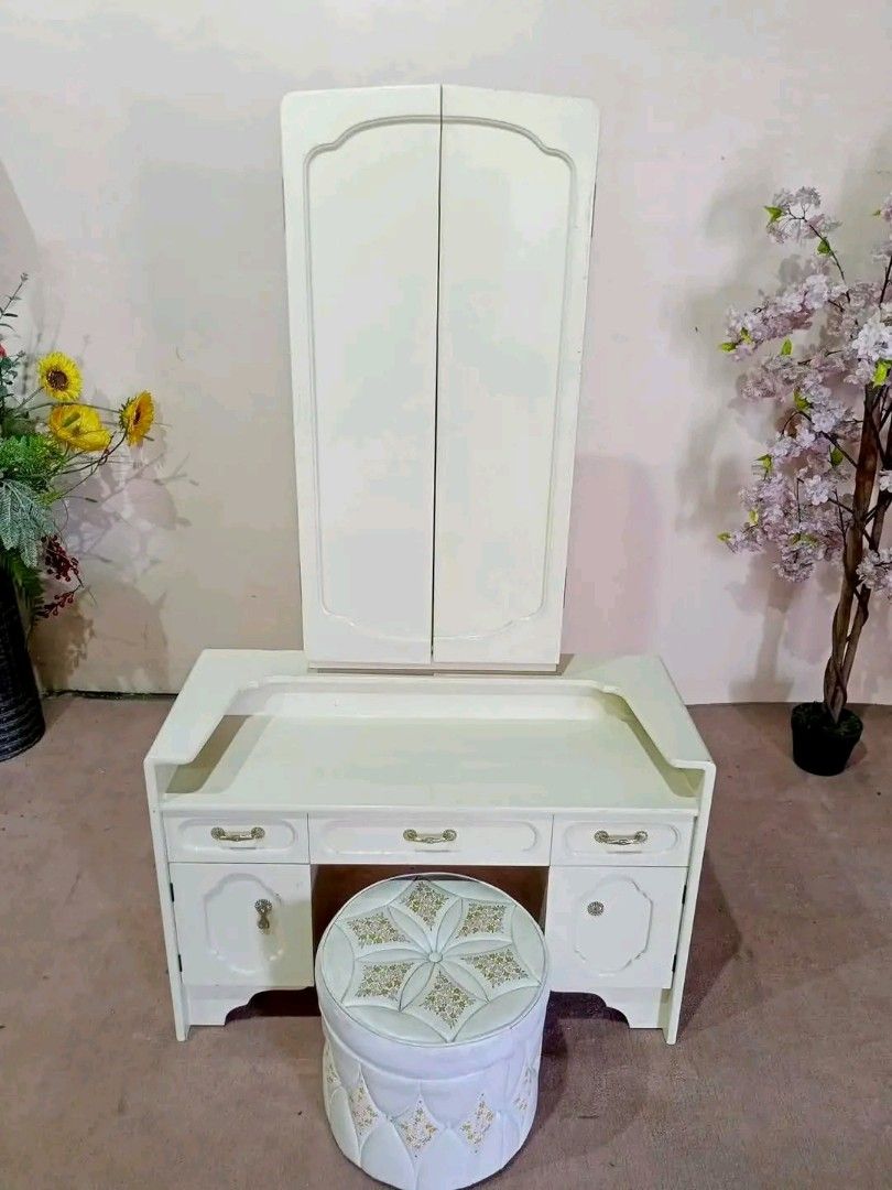 Cream Vanity Dressing Table with Stool and Mirror (Category: Tables & Sets) located in Manila. Submitted by eloizavill76462 (Listing ID 1445809771, Image 2). Description: White Elegant Trifold Mirror Vanity Dresser w/ Round Stool Storage 36”L x 15”W x 60”H.