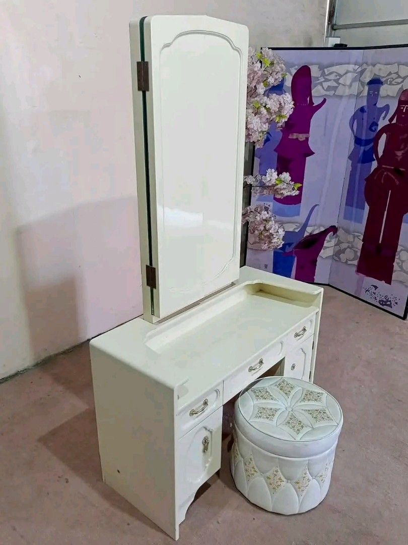 Cream Vanity Dressing Table with Stool and Mirror (Category: Tables & Sets) located in Manila. Submitted by eloizavill76462 (Listing ID 1445809771, Image 3). Description: White Elegant Trifold Mirror Vanity Dresser w/ Round Stool Storage 36”L x 15”W x 60”H.