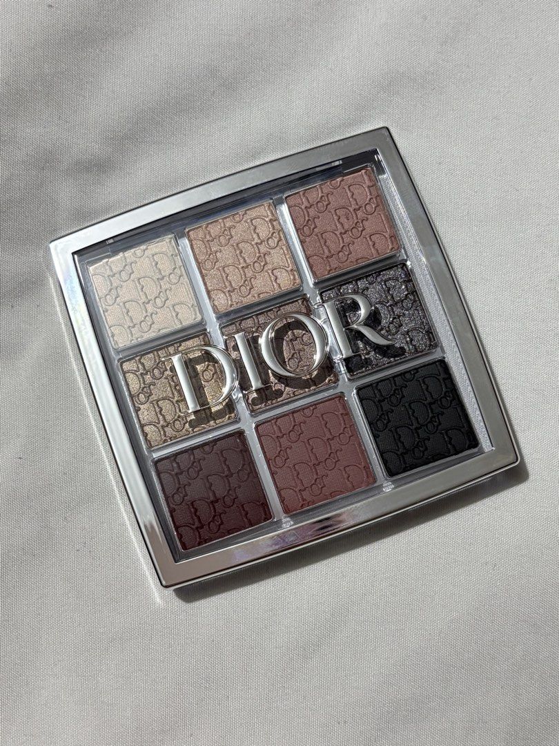 Dior Backstage Eye Palette 002 Cool Neutrals (Category: Makeup) located in Manila. Submitted by mucha6ble (Listing ID 1445877907, Image 1). Description: - Dior Backstage Eye Palette in shade 002 Cool Neutrals. - Features 9 beautiful shades with satin, shimmer, metal, and matte finishes. - Includes: pearl, beige, soft rose, light sand, soft taupe, deep plum, mauve, and black. - Net weight: 10g. - Bought at Dior SM Moa.