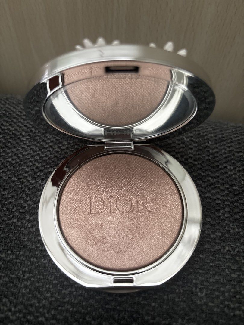 Dior Limited Edition Highlighter Compact - Daisy & Ladybug Design (Category: Makeup) located in Makati City. Submitted by thriftshopmkti (Listing ID 1445848214, Image 2). Description: LAST PRICE POSTED - Limited Edition Dior Highlighter - Features a beautiful quilted white case - Adorned with a charming daisy and ladybug design - Highlighter offers a subtle, natural shimmer - Perfect for achieving a healthy glow - Compact and travel-friendly size