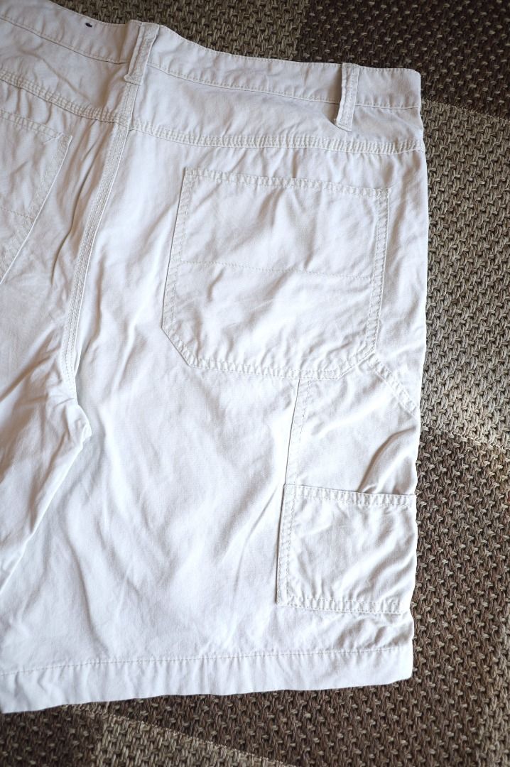 Faded Glory Off-White Baggy Carpenter Shorts (Category: Shorts) located in Pasig City. Submitted by mlclmchrs (Listing ID 1445962721, Image 3). Description: Sizing: 38 on tag (Baggy Fit) Waist - 40 inches Length - 22.5 inches Thigh - 15.5 inches Rise - 12.5 inches Hem - 14 inches Issues: red stain on inner waist (not visible when worn).