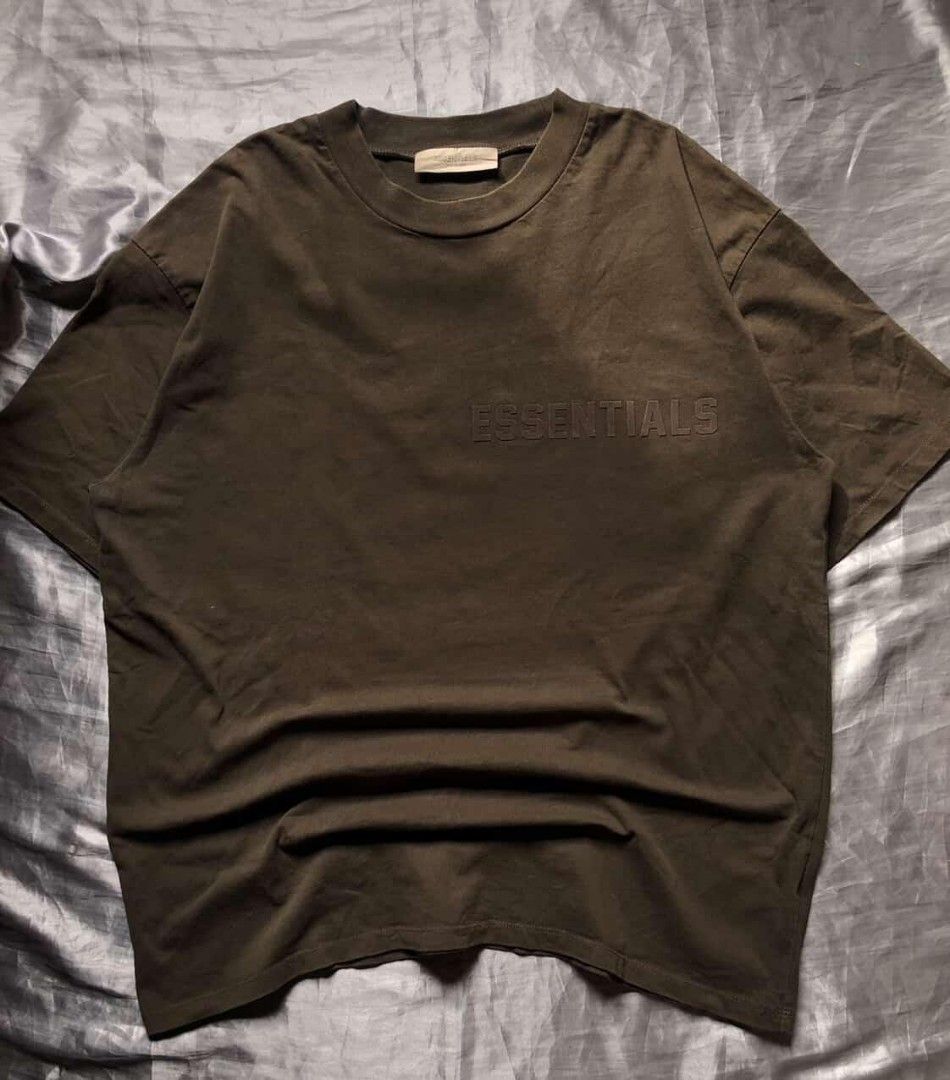 Fear of God Essentials (Category: Tshirts & Polo Shirts ) located in Taguig. Submitted by marked_item (Listing ID 1445824612, Image 2). Description: ESSENTIALS 💎 📍Brown Color Way 📍9.5/10 Condition 📍W 25-28 L31 (oversized fit) 📍Complete Tags 📍Carpetize Script 📍Heavy Cotton .