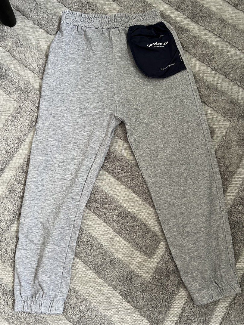Grey Sweatpants with Navy Pocket Detail (Category: Babies & Kids Fashion) located in Dasmarinas. Submitted by shoptinyframe (Listing ID 1445804501, Image 1). Description: - Comfy grey sweatpants - Elastic waistband for a comfortable fit - Navy blue pocket on the right side - Ideal for lounging and casual wear - Versatile: easily pairs with any top.