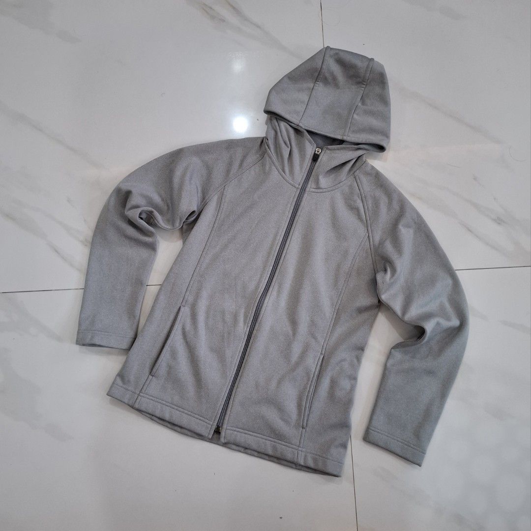Grey Zip-Up Hoodie with Pockets (Category: Coats, Jackets and Outerwear) located in Bay. Submitted by r.thrift (Listing ID 1445853504, Image 3). Description: - Grey zip-up hoodie - Features a hood - Two front pockets - Simple and comfortable design - Ideal for casual wear or layering - Soft, easy-care material - A versatile wardrobe essential - Dimes L:23 W:17 -women size.