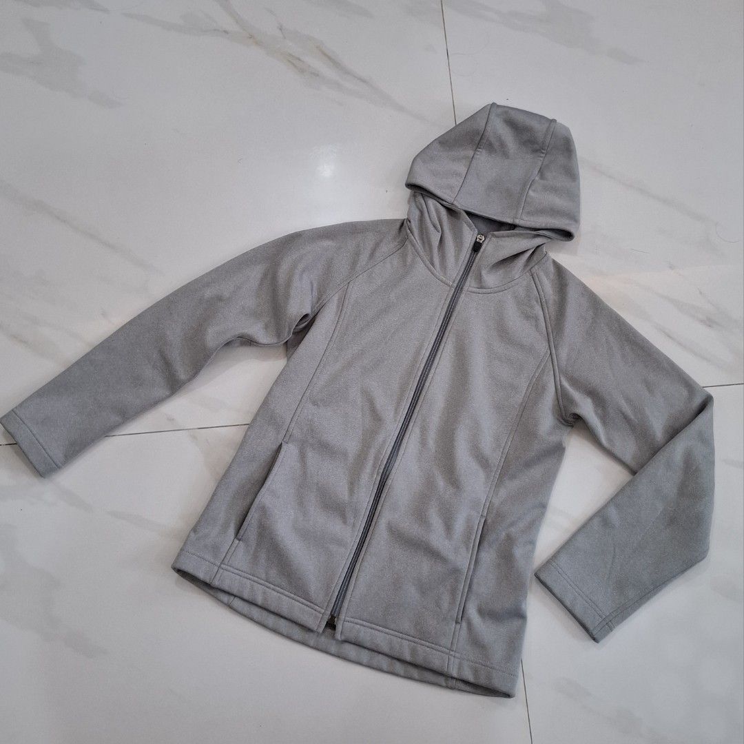 Grey Zip-Up Hoodie with Pockets (Category: Coats, Jackets and Outerwear) located in Bay. Submitted by r.thrift (Listing ID 1445853504, Image 1). Description: - Grey zip-up hoodie - Features a hood - Two front pockets - Simple and comfortable design - Ideal for casual wear or layering - Soft, easy-care material - A versatile wardrobe essential - Dimes L:23 W:17 -women size.